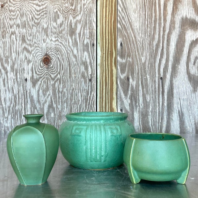 Infuse your home with timeless American charm with this vintage trio of matte glazed ceramic vases. Crafted with attention...