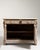 A richly carved Henry II style buffet featuring bold paneling and sculptural relief work inspired by Renaissance design....