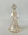 Single Murano glass angel shaped candle holder. Gold foil inclusions to glass give a shimmering effect. 8-1/4" H X 4-1/2"...