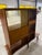 Authentic MCM room divider display unit in rich wood and with glass doors.