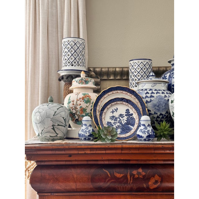 With a quintessential 1960's turquoise blue and green floral motif accented in orange, here is a designer's favorite: the...