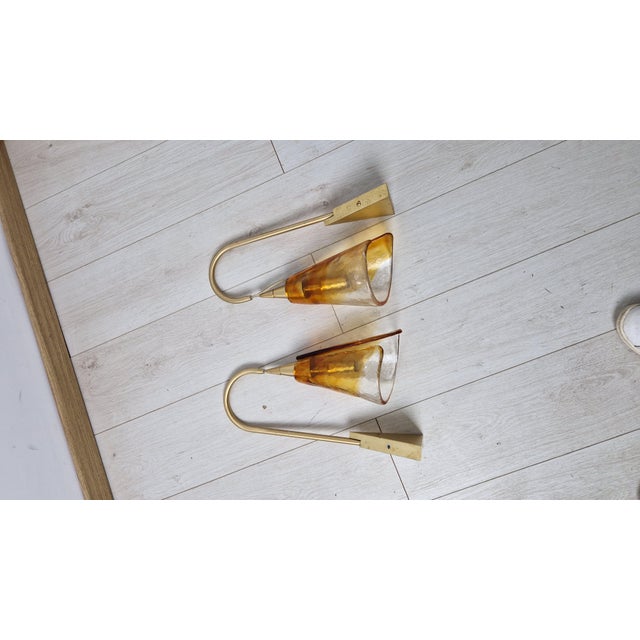 Wall Lamps in Clear Orange Glass and Gold-Plated Brass by La Murrina, 1980s, Set of 2, in Very Good conditions. Designed...