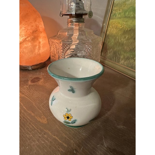 Up for consideration is a beautiful small Austrian ceramic vase with floral painted details. This would look lovely in...