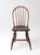 Mid-century Windsor style wood chair with a tall hoop back, slender spindles, shaped seat, and turned legs and stretchers....