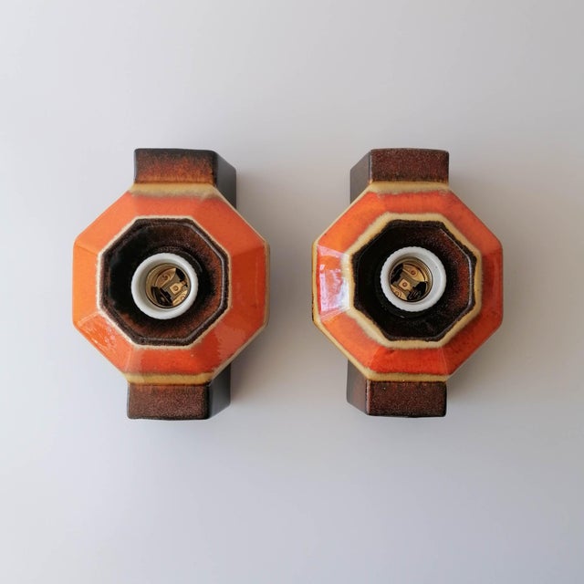 Discover a stunning pair of ceramic sconces crafted by renowned german lighting brand pan hustadt leuchten during the...