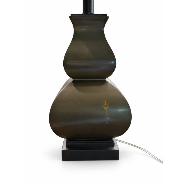 Attention: this lamp has a cosmetic flaw. Please see second photo. This flaw is not on the front of the lamp but on the...