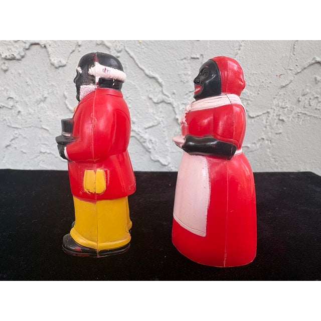 Offered is a vintage mid-century salt and pepper shaker set depicting “Aunt Jemima” and “Uncle Mose,” manufactured by F&F...