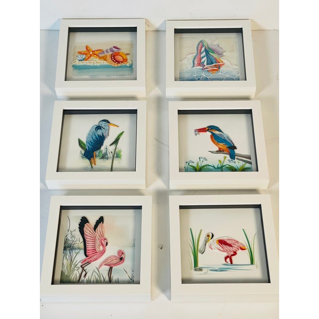 Beautiful handmade paper art Florida coastal theme items in modern white frames. , sea shells, flamingoes, pelican, parrot, .