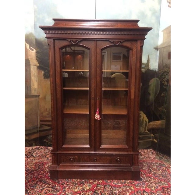 Item: Antique Victorian Bookcase with Glass Shelves. Age & Condition: Circa 1880. Nicely restored. Good condition....
