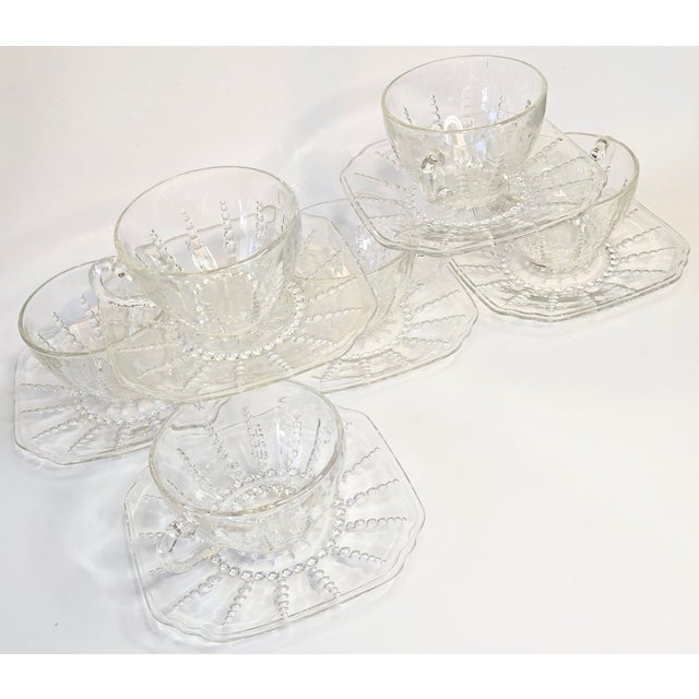 This mid century Starburst design looks like some sort of jellyfish made into teacups. The coastal boho design is perfect...