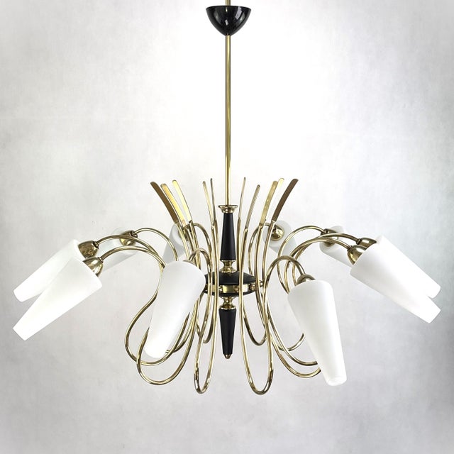 The unusual lamp is a real classic from the 1950s. This large lamp has an extraordinary design and is a highlight for...