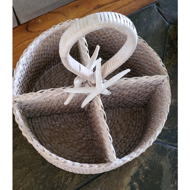 Add a touch of coastal charm to your home with this vintage large silverware basket. Made of wood and straw and woven with...
