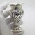 A refined vintage decorative piece depicting a medium-sized Sicilian vase with floral motif, handmade in Continental...