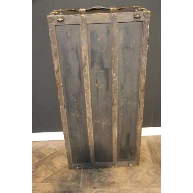 This very nice Louis Vuitton trunk features hand stenciled monogram canvas , light honey color lozine trim and Louis...