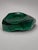 A striking pair of sculptural desk dishes carved from exceptionally decorative malachite, each fashioned as a low,...