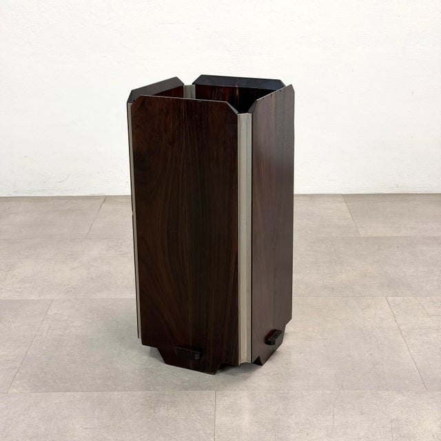 Umbrella stand designed in 1960 by Ico Parisi for Stildomuselezione. Made of rosewood with matte chrome-plated brass...