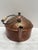 Large French farmhouse antique copper and brass kettle with rustic wood handle. Authentic, aged, weathered charm. The...