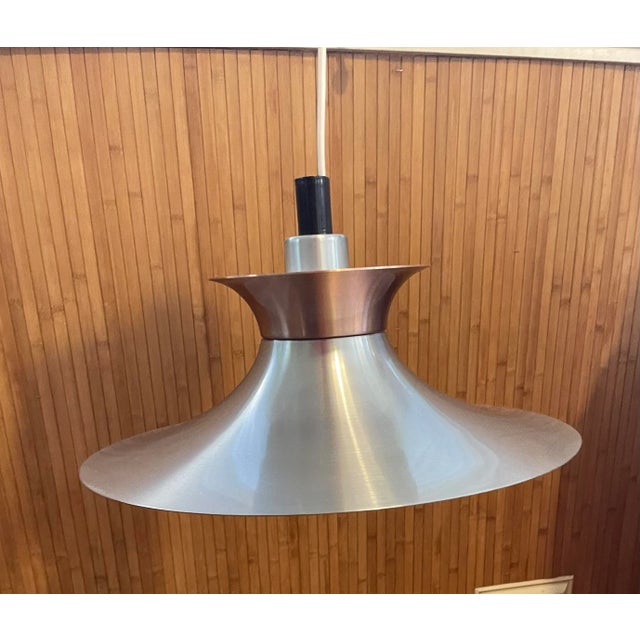 Radius 1 pendant by Erik Balslev. silver and copper aluminum. Produced by Fog & Mørup. Measures: 16" in diameter version...