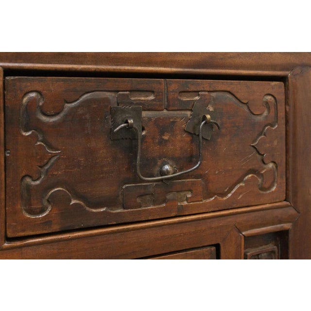 Early 19th-century chinese sideboard made of solid elm wood, heavy, sturdy, and beautifully crafted. the sides and center...