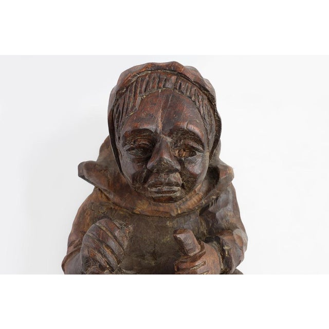 This mid‑19th‑century French carved oak wall figure of a woman is a compelling example of provincial craftsmanship,...