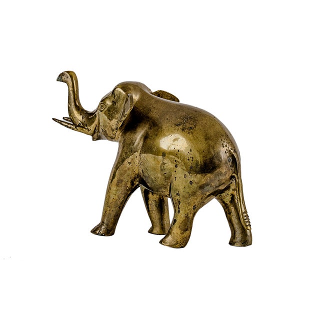 Vintage Mid-Century Modern Solid Brass Elephant Figurine. Highly popular Mid-Century Modern decor trend typically...