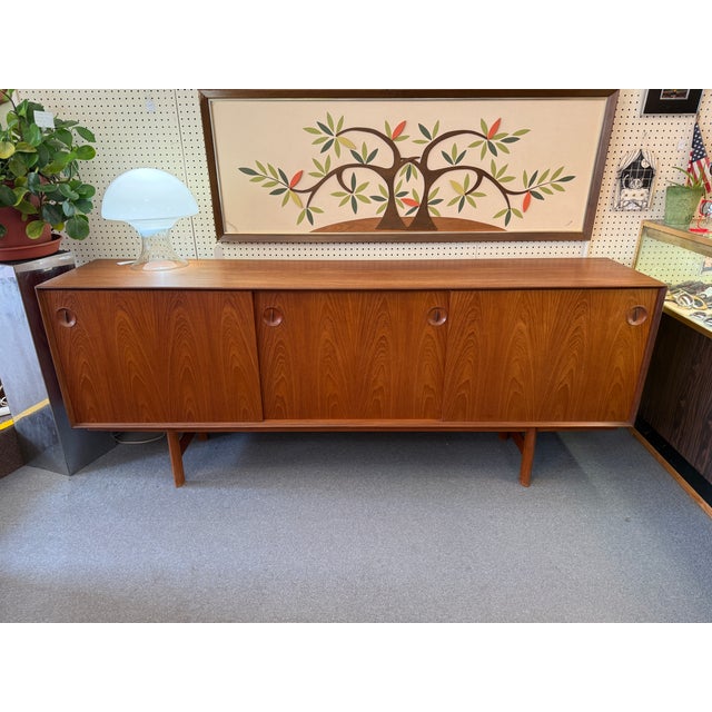 You are viewing a fantastic Danish Teak Sliding Door Credenza, attributed to Fredrik Kayser for Gustav Bahus c1960s. The...