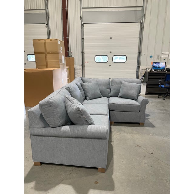 This 2-piece sectional sofa by Lee Industries blends comfort with clean modern styling. Made in the USA, it is upholstered...