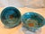Pair Antique Chinese tea or rice bowls. They are painted with a raised enameled floral motif with the 'Double Happiness"...