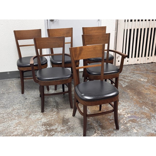 Design Plus Gallery presents a Set of Six Dining Chairs from Pottery Barn. This coordinated set includes two armchairs and...
