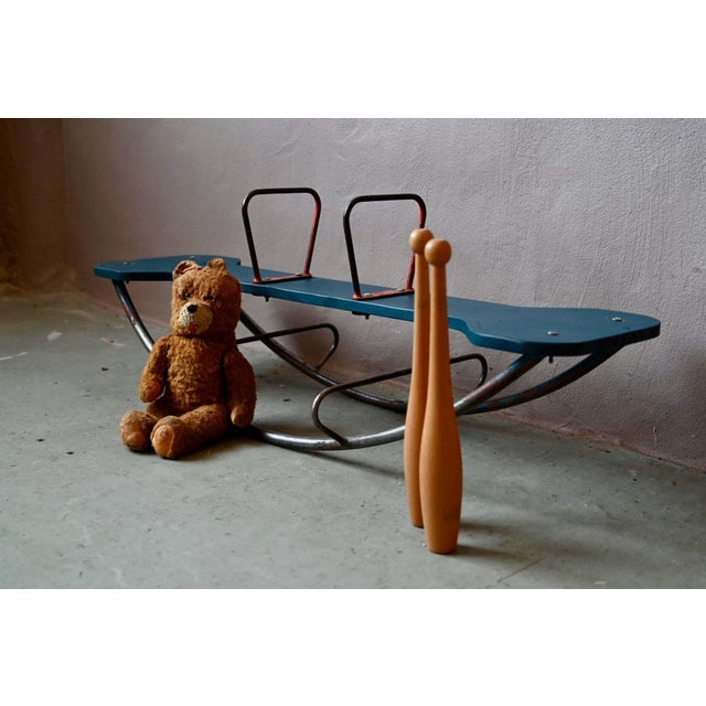 It graced playgrounds and flower gardens… Here is an adorable two-seater rocking chair for children, typical of the 1960s,...