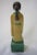 Porcelain polychrome Chinese immortal figure. Standing on a draped pedestal. Very good coloring and good casting. The size...