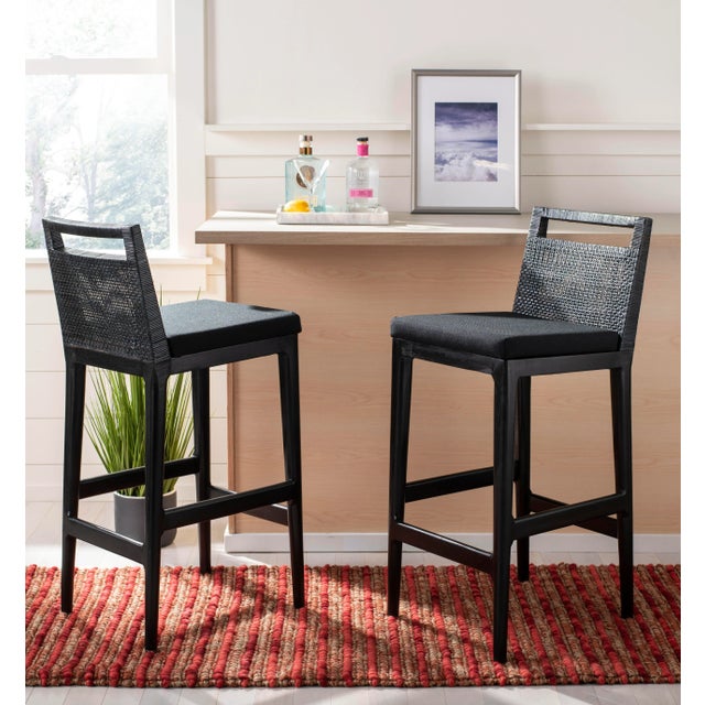 Spa life. Furnishings at five-star resorts in the Maldives inspired this casual Barstool. Minimalist geometry and clean...