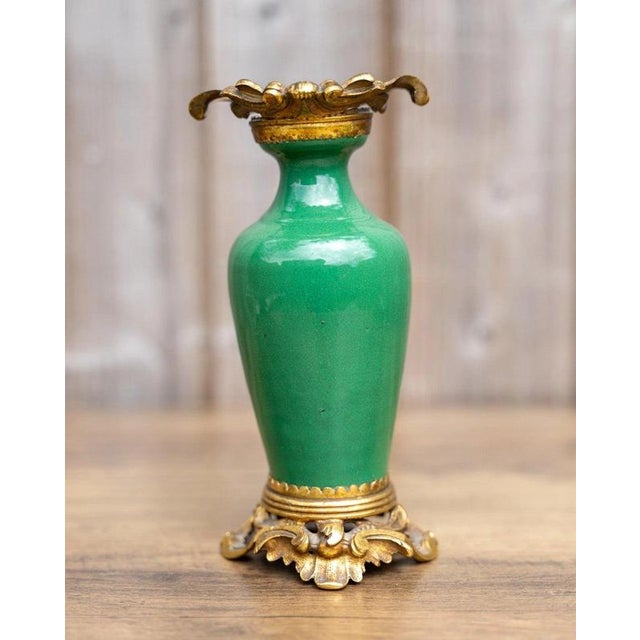 A charming antique Chinese Qing dynasty porcelain vase dating to the second half of the 19th century, distinguished by its...