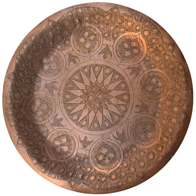 Mid-Century highly crafted, engraved and detailed Moroccan tray. Constructed of solid copper, engraved with remarkable...