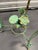 1970s Large Verdigris Wrought Iron Standing Planters With Decorative Dangling Rose and Leaf Motif, a Pair For Sale - Image 11 of 12