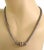 Hallmark: JH 18k Material: 18k yellow gold and sterling silver Measurement: chain: 18.25" long x 4.5mm thick Bead pendant:...