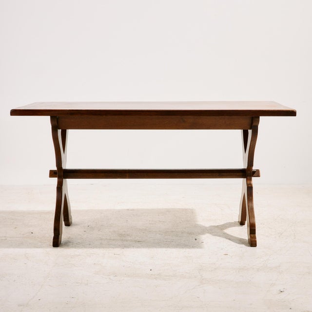 A brutalist oak dining set from the 1970s. The set consists of six chairs and one dining table. The set has sculptural...