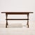 A brutalist oak dining set from the 1970s. The set consists of six chairs and one dining table. The set has sculptural...