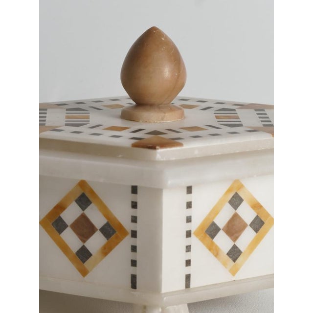 An Exceptional Italian Grand Tour Pietra Dura and Alabaster Hexagonal Box, Circa 1900. This exquisite hexagonal lidded box...