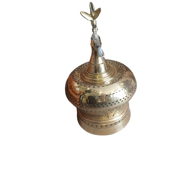 Vintage large hand hammered brass Turkish Brazier made into a pendant lamp. Brazier is pierced making the light create a...