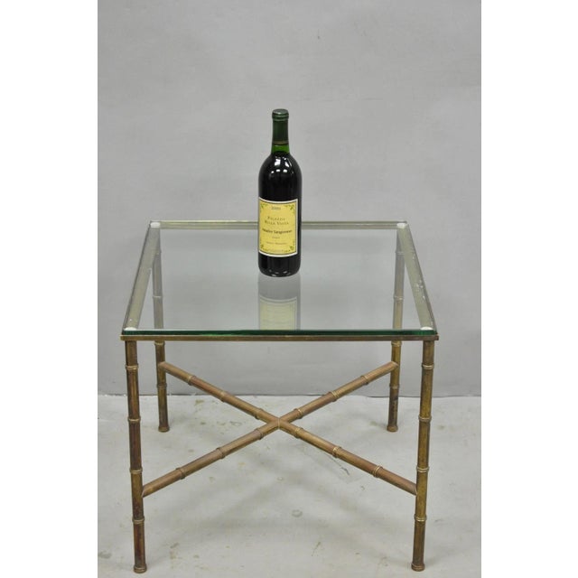Vintage Hollywood Regency Brass Faux Bamboo Square Glass Top Low Side Table with X-form Cross Stretcher Base. Circa Mid...