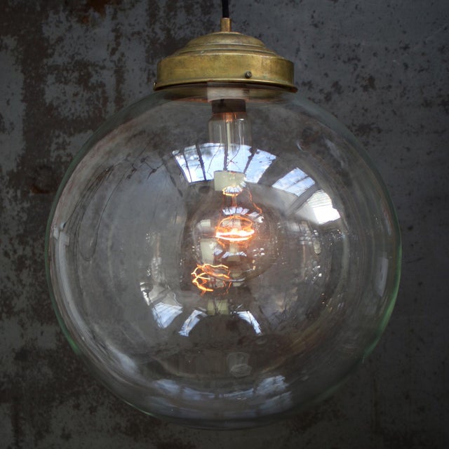 Clear glass globe with Brass 2 meter black cotton flex Brass top E27 / E26 Up to 250V (Europe/UK Standard).The wiring of...