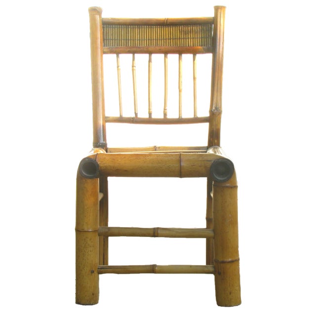 Diminutive natural bamboo / rattan accent chair -- perfect for a child or as an unique plant stand. Fabricated of large...