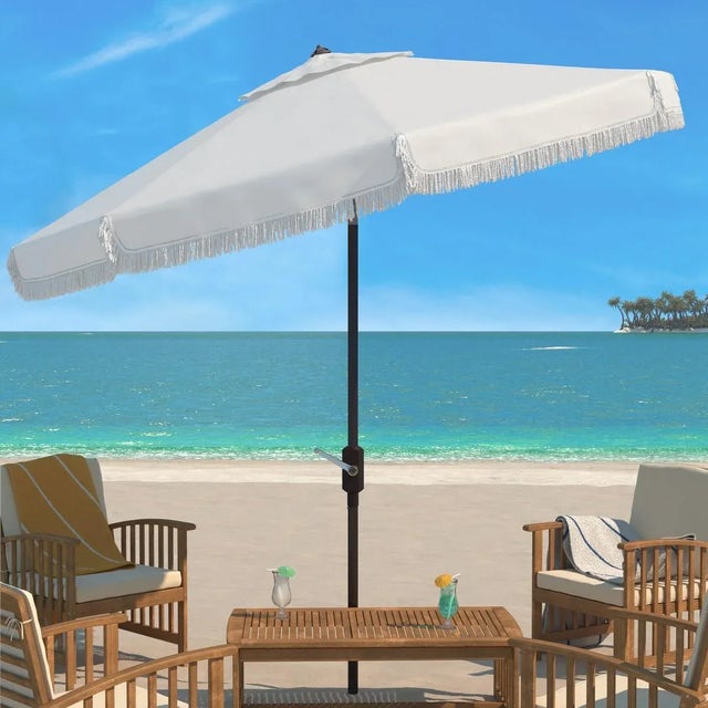 Summer afternoons at Mayfair’s private member’s club inspired this posh eleven foot crank umbrella. Its classic white...