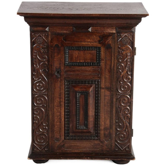 Age and Origin: The chest of drawers is likely from around 1880 and probably originates from Germany. Material: The wood...