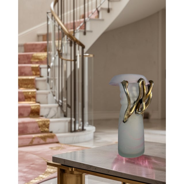 This 11 1/2 inch tall hand-blown art glass vase, made in Romania by Vasile Tubi Vădan, is distinguished by three applied...