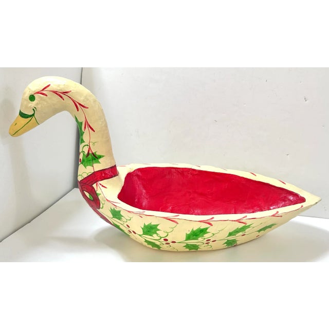 A striking vintage hand-painted paper mache swan bowl, designed as a whimsical holiday centerpiece or decorative serving...