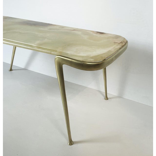 A splendid coffee table by Cesare Lacca, made in Italy in the 1950s, a refined example of Italian Midcentury Modern...