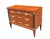 An important pair of neoclassical three-drawer commodes. Cherrywood with ebonized pilasters, patinated bronze pulls,...