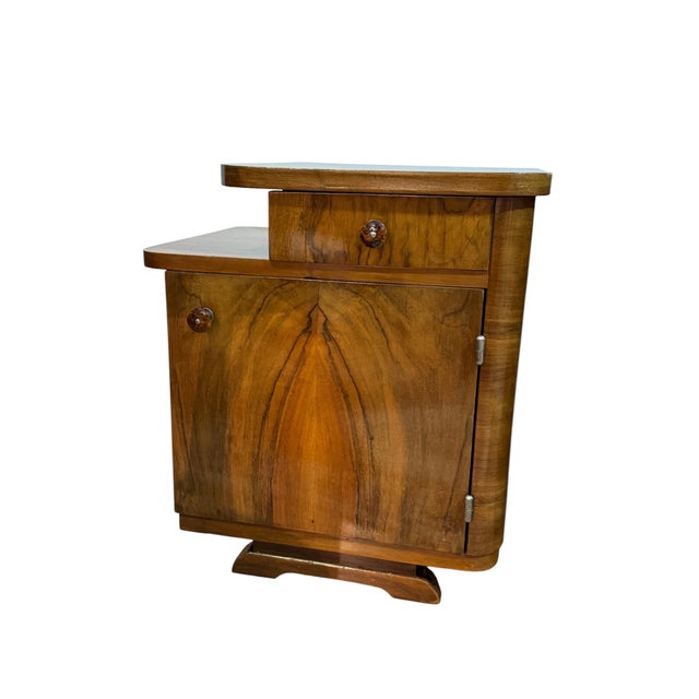 Set of two Art Deco nightstands, Central Europe, 1930s. Spruce and plywood veneered in walnut root veneer, chrome and...
